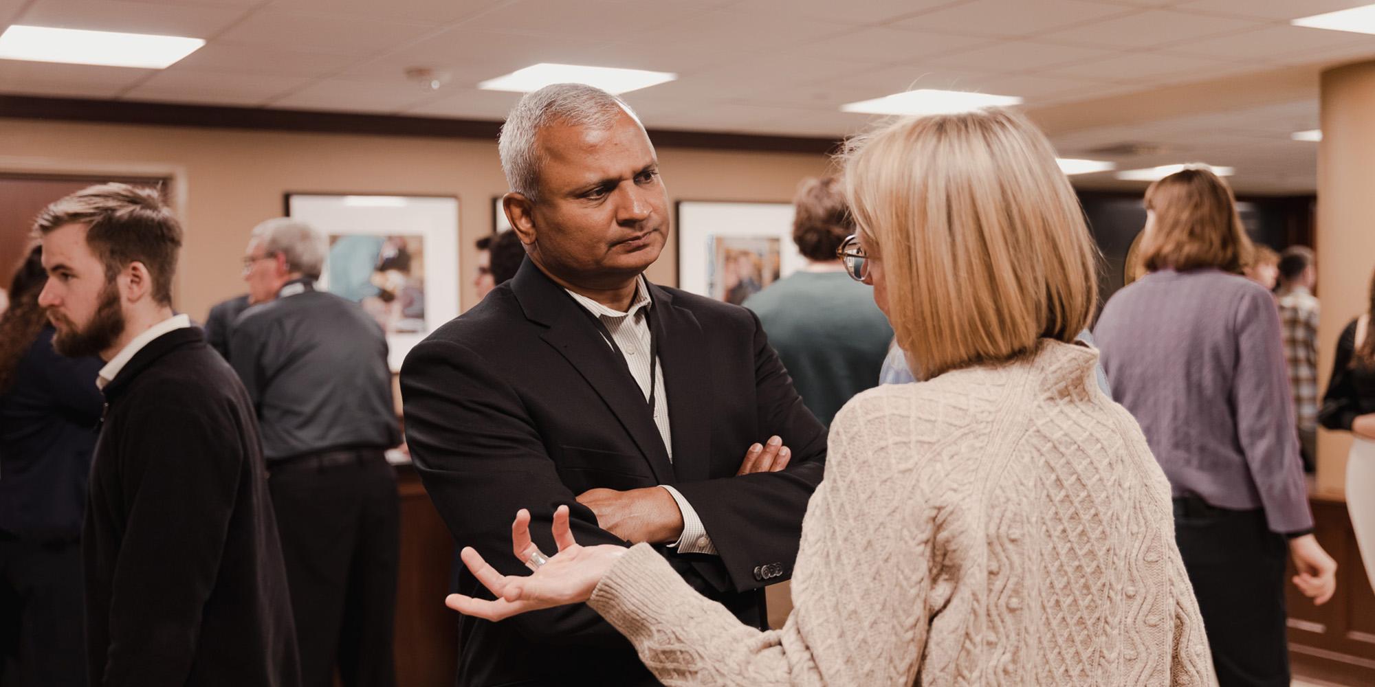 Attendees in conversation at the Symposium on Transforming Culture