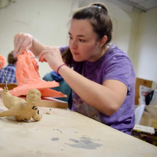 A student in sculpture class